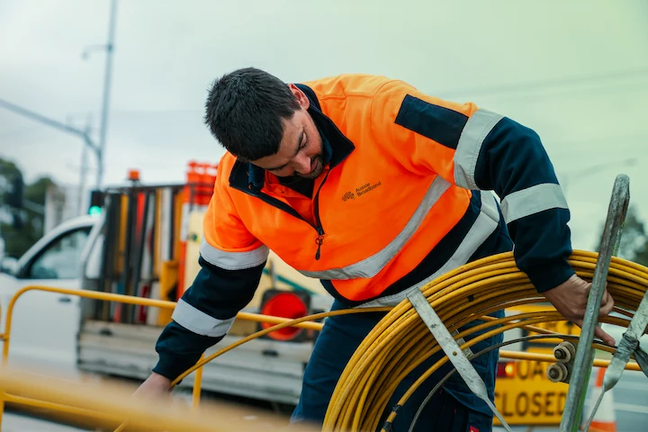 Person installing fibre